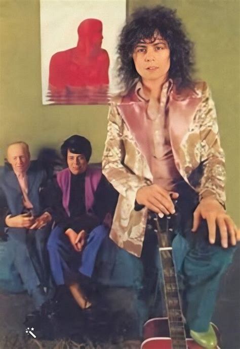 Marc Bolan with his mum and dad. Digitally altered image as enhanced.