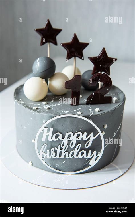 Birthday cake with 12 years old Stock Photo - Alamy