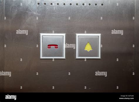 call and alarm button for emergency in elevator Stock Photo - Alamy