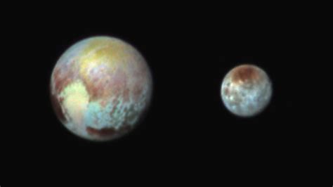 NASA Releases Stunning Color Images of Pluto and Charon | WIRED