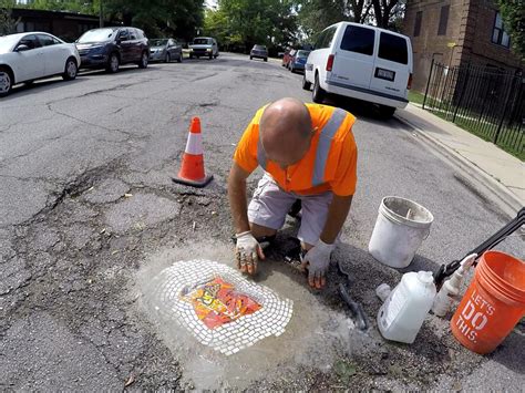 Street art: Jim Bachor's pothole mosaics