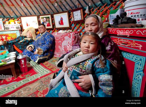 Mongolian family in a yurt, Ujimqin Grassland, East Ujimqin Banner, Xilin Gol League, Inner ...