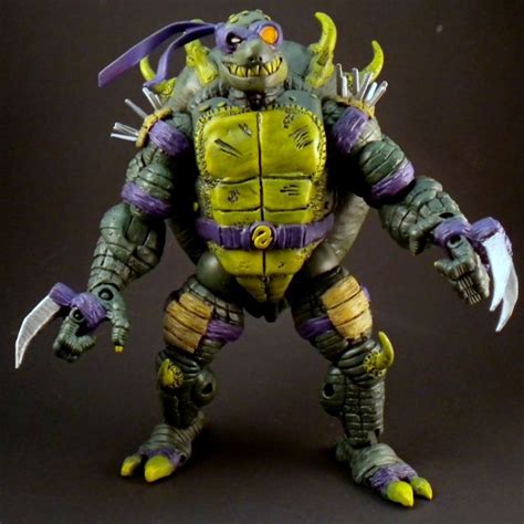 the action figure is made to look like a creature with yellow and purple paint on it