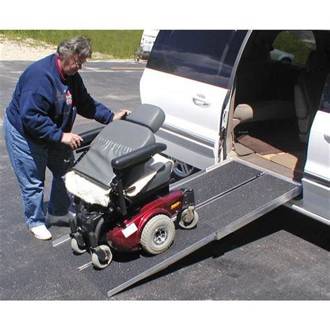 Portable wheelchair ramps being used on a van | Wheelchair ramp, Portable wheelchair ramp ...