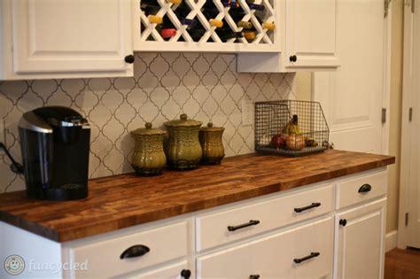 White Kitchen Cabinets with White Quartz and Butcher Block Counters - FunCycled