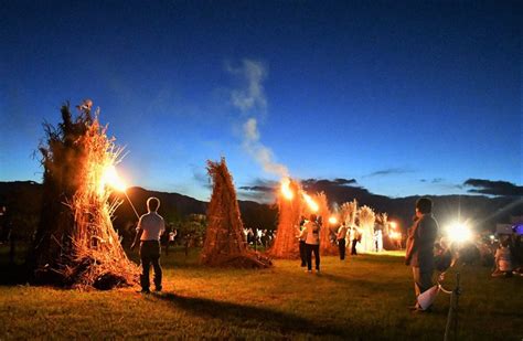 In Photos: Giant 'torches,' fireworks light up night sky on shore of Japan's largest lake - The ...