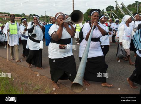 Members of the Shembe faith (Nazareth Baptist Church), a religious hybrid of Christianity and ...