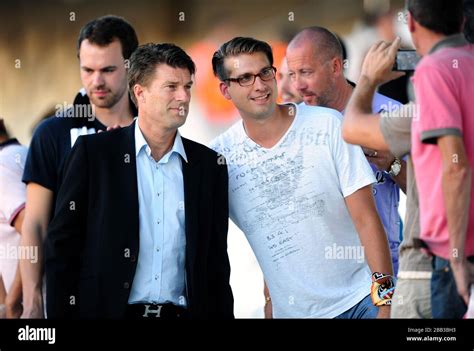 Swansea City's Manager Michael Laudrup poses for pictures with fans Stock Photo - Alamy