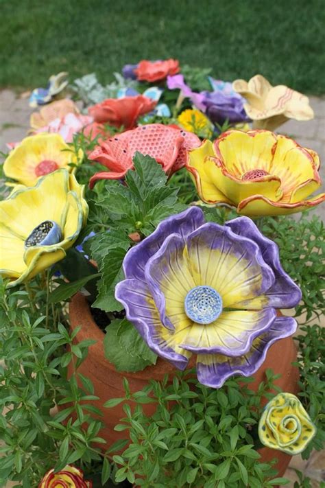 Image result for ceramic flowers making | Ceramic flowers, Clay flowers, Pottery flowers