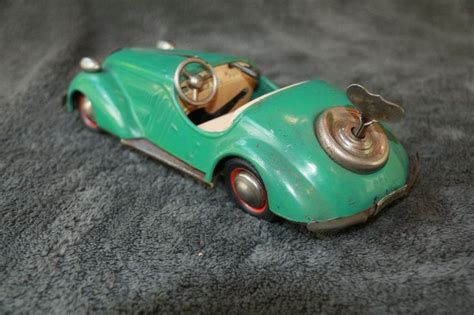 Distler Wanderer tin wind up toy sports car Germany | German toys, Vintage toys, Wind-up toys