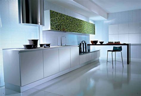 All white laminate cabinets, white formica tops, polished concrete floors and a splash of color ...