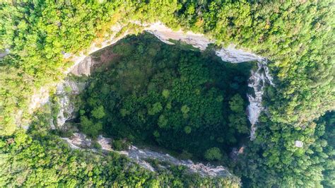 Live: A virtual tour of newly discovered giant karst sinkhole in China ...