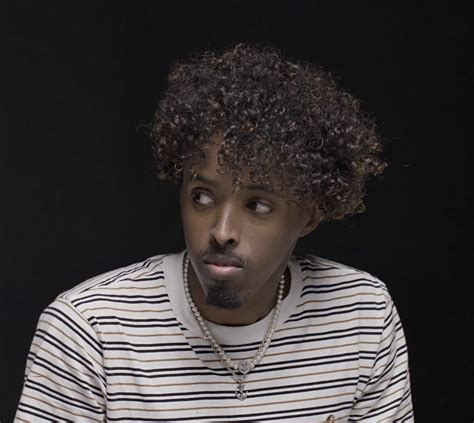 Curly-haired Man with Striped Shirt