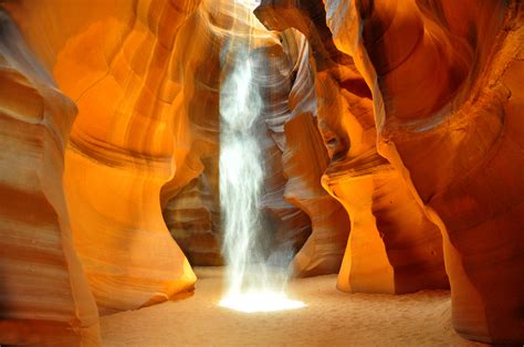 Wander through the winding golden corridors of Antelope Canyon ...