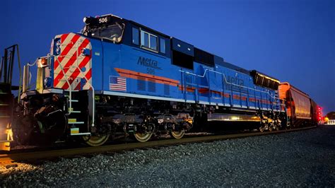 Metra SD70MACH trails on the CSX M648-24 in Evansville, IN - May 25 ...