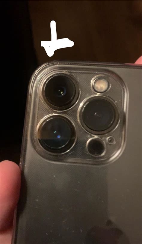 Spec or crack on iPhone 13 Pro camera lens. : r/iphone