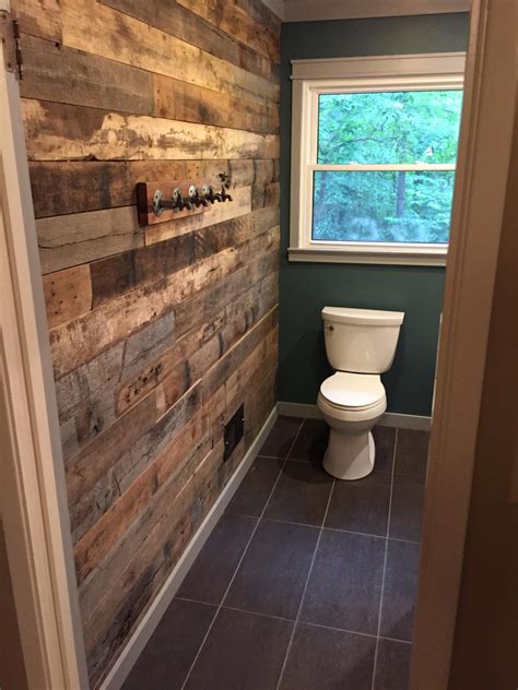 Bathroom accent wall from reclaimed barn wood. Pallet Wall Bathroom ...