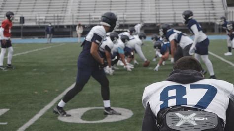 The University of Maine football team hung sings of unity Friday ...