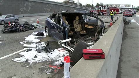 NTSB says it removed Tesla from deadly crash investigation, Tesla ...