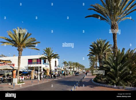 Cafes and restaurants along the promenade outside Agadir Marina, Agadir, Morocco, North Africa ...