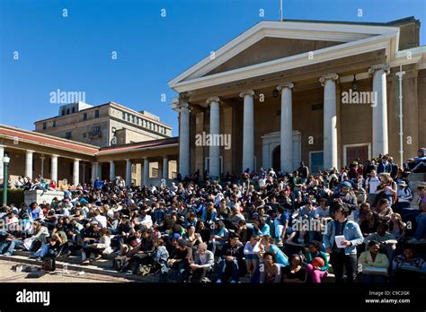 Students gathering on the stairs of the University of Cape Town campus ...