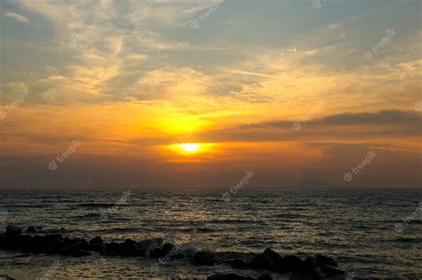 Premium Photo | Dramatic sunset in dark clouds over the sea