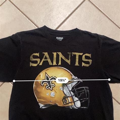 Up for sale is a size large New Orleans Saints Shirt... - Depop