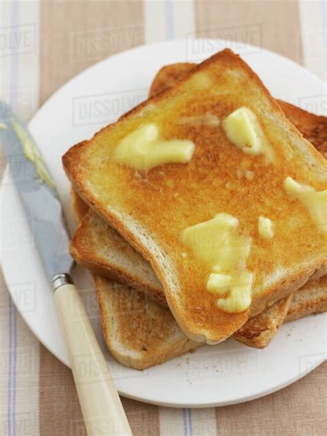 Buttered toast - Stock Photo - Dissolve