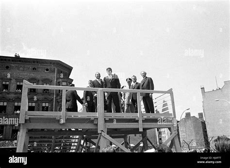 US president John F. Kennedy at a view point at the Berlin wall on 26 June 1963. At right german ...