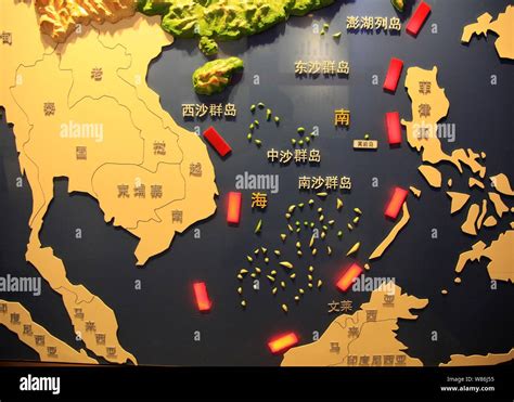 A map of the South China Sea and Nansha Islands is on display at a national defence education ...