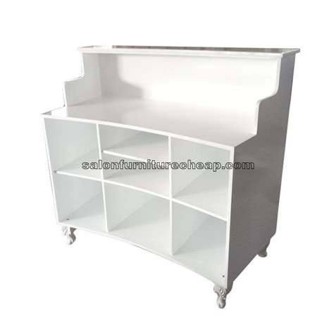 White curved reception desk