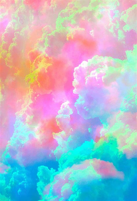 the sky is filled with colorful clouds in pastel colors