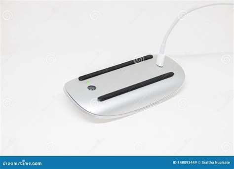 Charging a wireless mouse stock image. Image of cable - 148093449