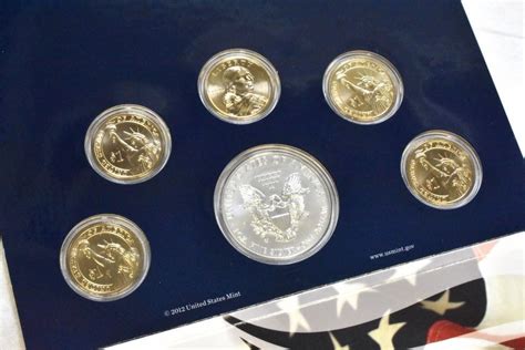 2012 UNITED STATES MINT ANNUAL UNCIRCULATED DOLLAR COIN SET (SILVER EAGLE AND GOLDEN DOLLARS)