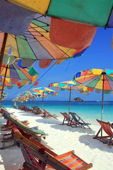 Colorful beach umbrellas under blue sky, Phuket Beach - Thailand | Phuket thailand, Phuket, Beach