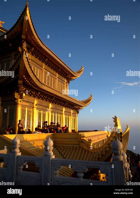 Sunrise dawn temples at the Golden summit of Mount Emei, Emei Shan, near Leshan, Sichuan ...