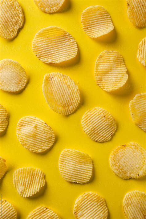 Potato Chips On Yellow Background. by BONNINSTUDIO | Food wallpaper, Yellow background, Food ...