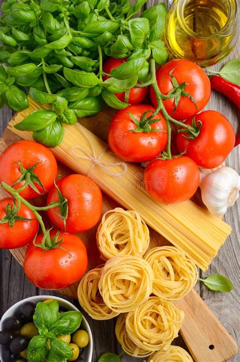 Pasta, Vegetables, Herbs and Spices for Italian Food on Wooden ...