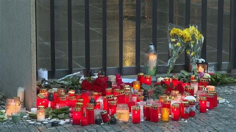 People in Prague pay their respects to victims of university shooting ...