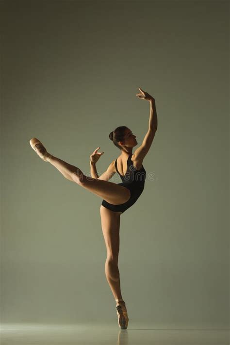 Young Graceful Female Ballet Dancer Dancing in Mixed Light Stock Image ...