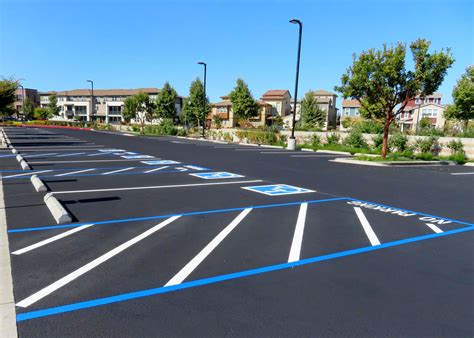 Freshly,Resurfaced,And,Repainted,Handicap,Parking,Space,In,A,Parking ...