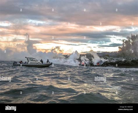 Lava boat tour Hawaii Stock Photo - Alamy