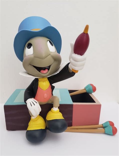 Disney Parks - Jiminy Cricket sitting on a Matchbox - - Catawiki