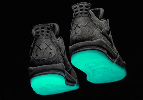 KAWS Air Jordan 4 Glow In The Dark Sole | SneakerNews.com