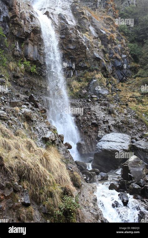 Mountain valley waterfall Stock Photo - Alamy