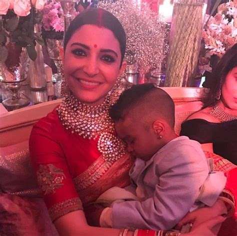 Adorable! Anushka Sharma takes care of Shikhar Dhawan’s baby at her reception