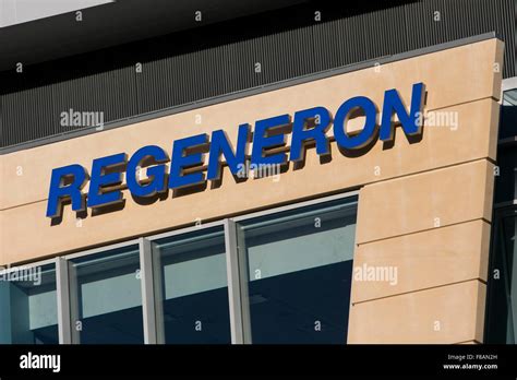 A logo sign outside of the headquarters of Regeneron Pharmaceuticals ...