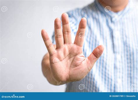 Man Showing Stop Sign with His Hand Stock Image - Image of five, sign: 265881789