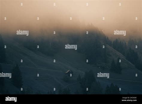 misty morning in the mountains during sunrise Stock Photo - Alamy