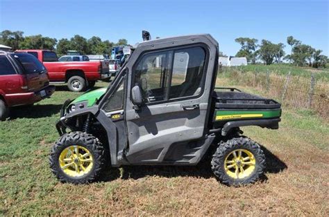 2016 John Deere RSX 860i Gator - Peterson Land & Auction LLC